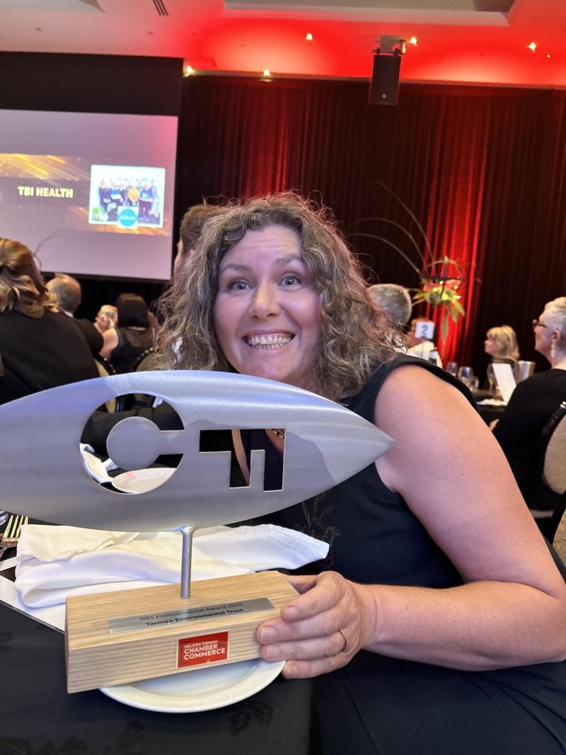 Sky Davies delightedly showing TET's trophy at the 2022 NTCC Business Awards